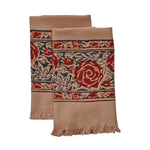 Block printed Rosebud hand towels, folded and laid flat. Towels have a rose border print.