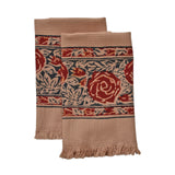 Block printed Rosebud hand towels, folded and laid flat. Towels have a rose border print.