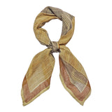 Vertical and horizontal striped block printed Savanna bandana tied flat against a white background