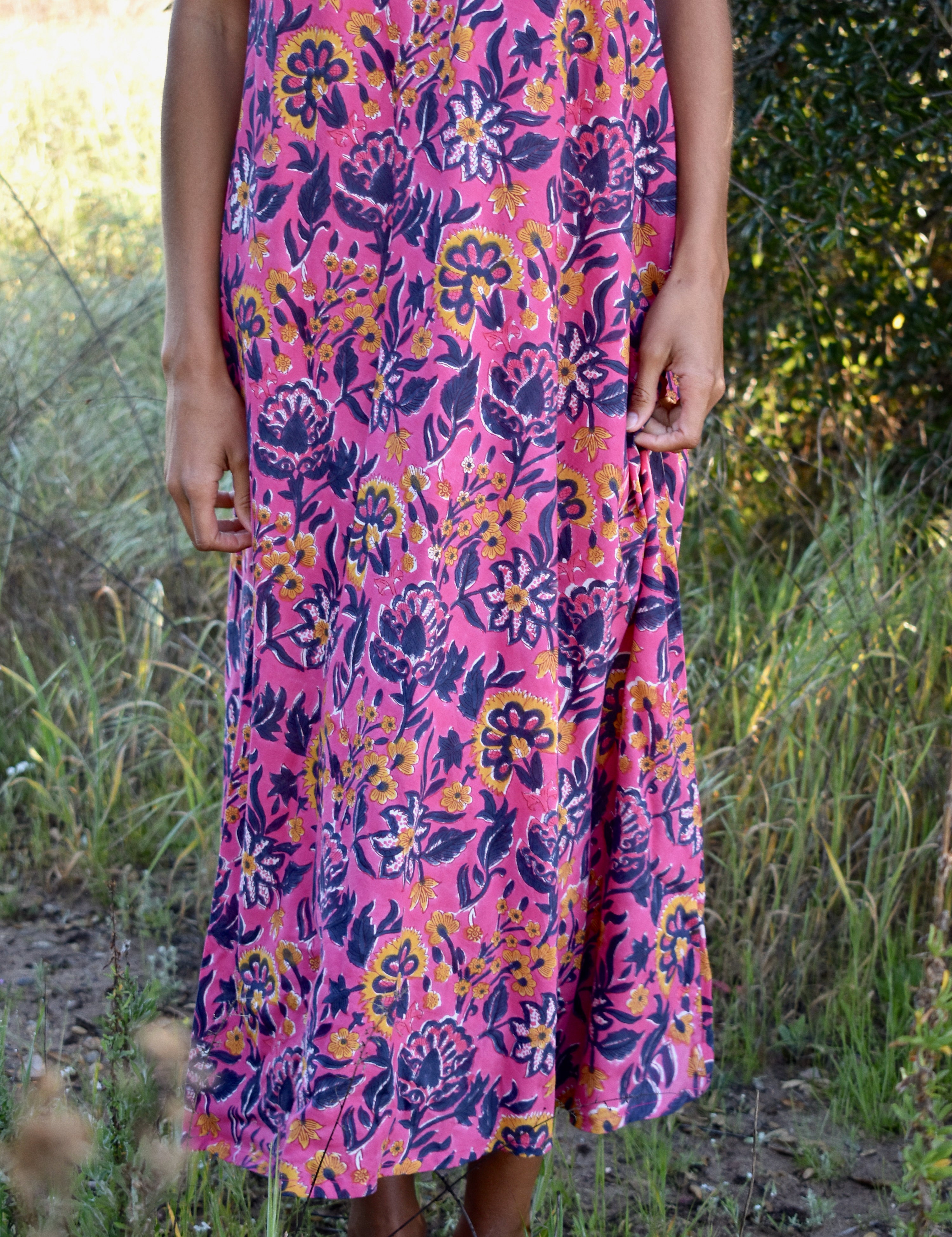 Close up of dress print, pink and purple florals