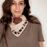 Woman wearing block printed starry Astral bandana around the neck