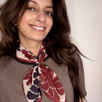 Woman wearing block printed floral Flora bandana around the neck