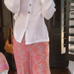 Nargis, co-founder of From, Mila, showing to how to style the Birkin cropped pant with a white shirt, loafers. Casual easy style for going out.