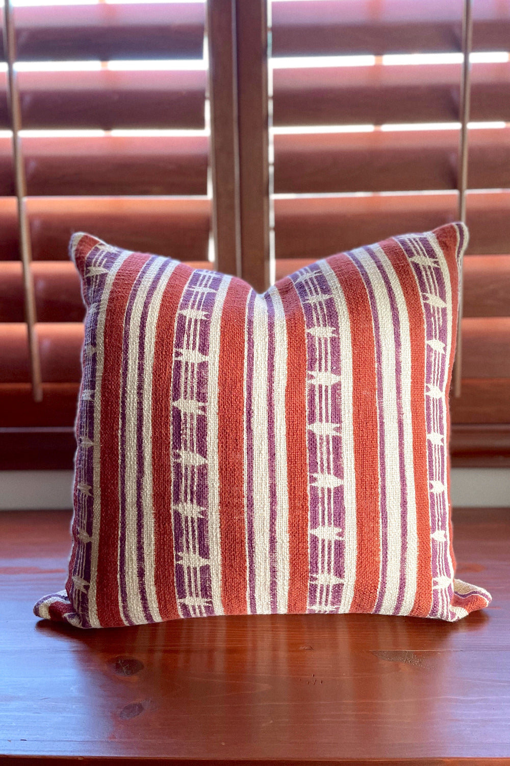 Mojave block print pillow on a wooden desk