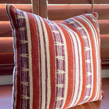 Mojave block print pillow on a wooden desk, angled