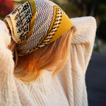 Model wearing Sol Bandana tied around her hair