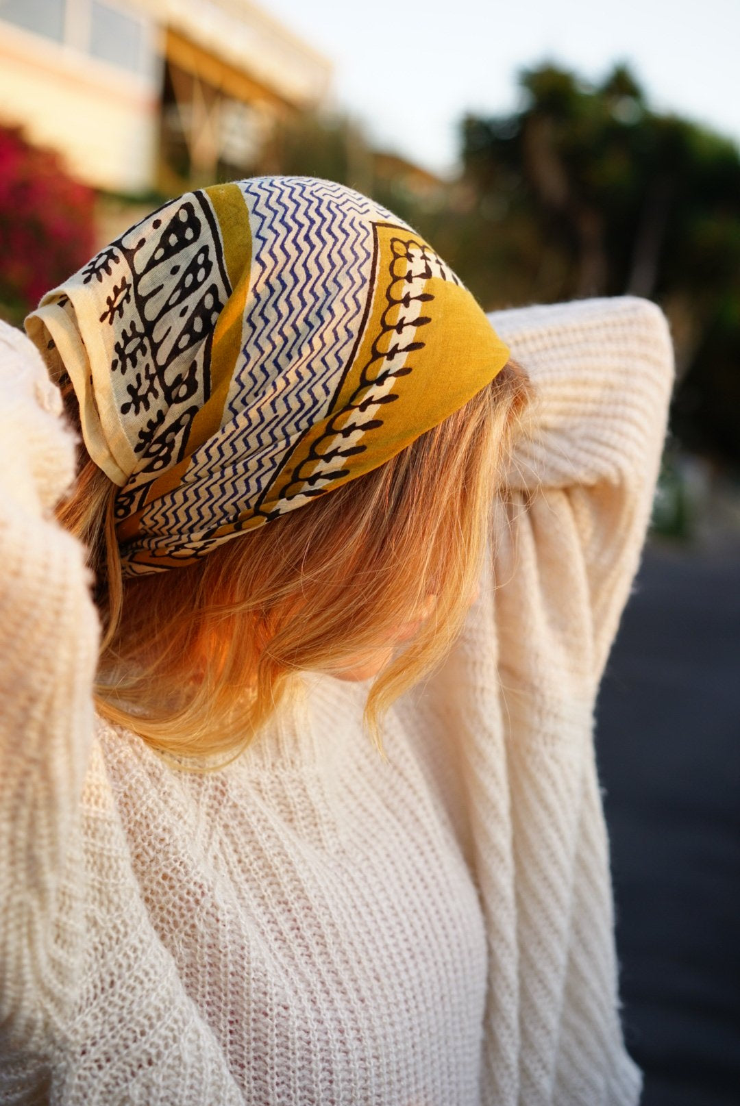 Model wearing Sol Bandana tied around her hair