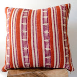 Mojave block print pillow on a stool against white
