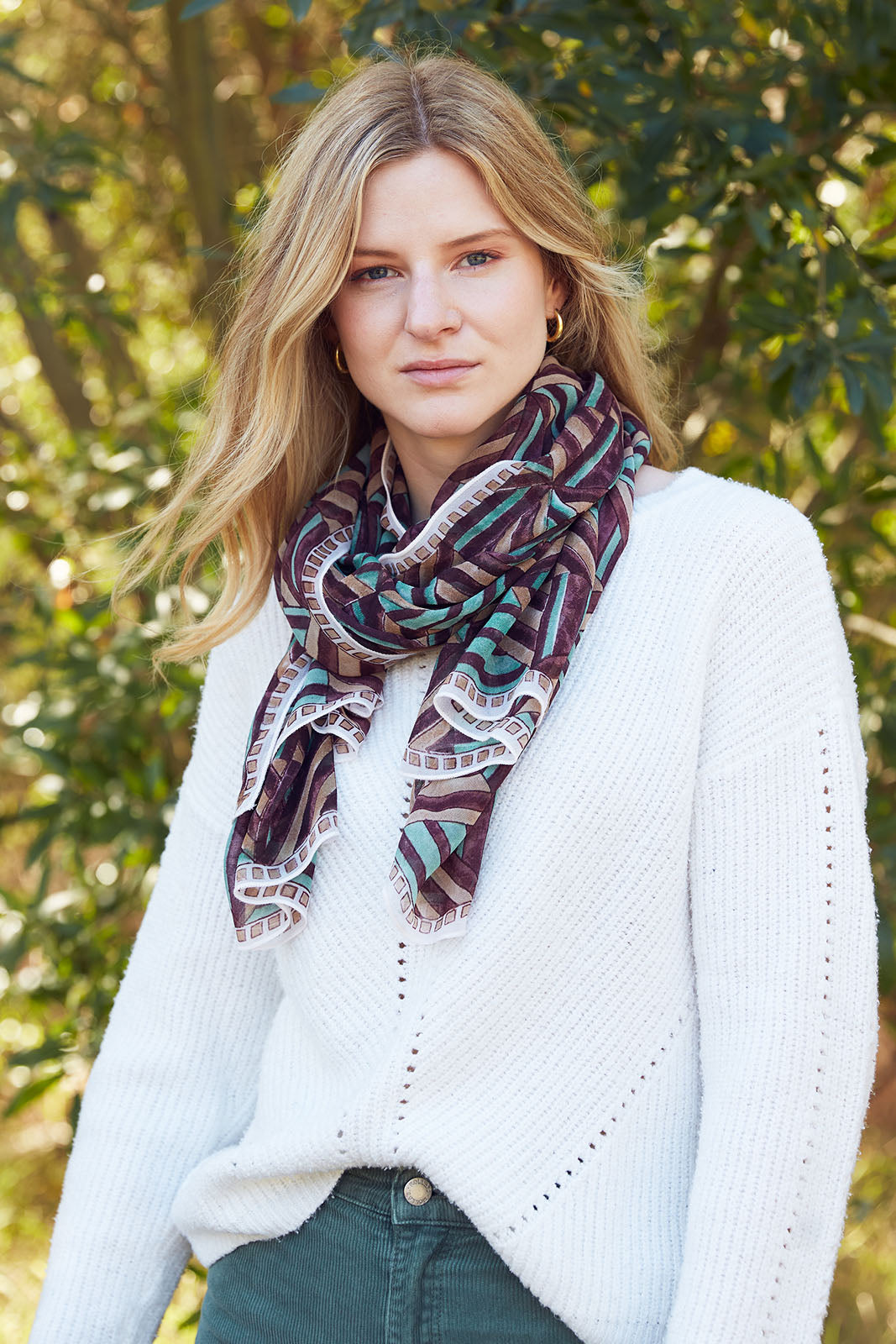 layla georgette scarf tied around the neck