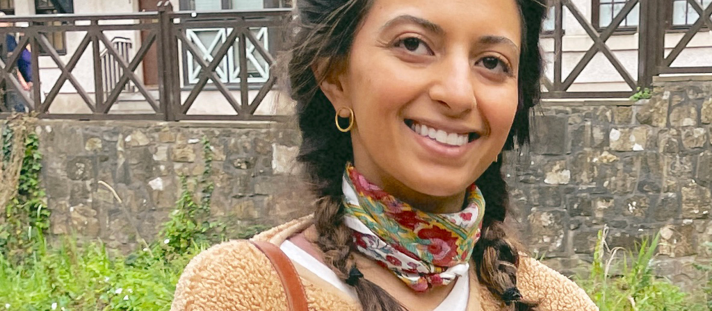 Nargis, founder of From, Mila, wearing the Veronica Bandana scarf tied around the neck