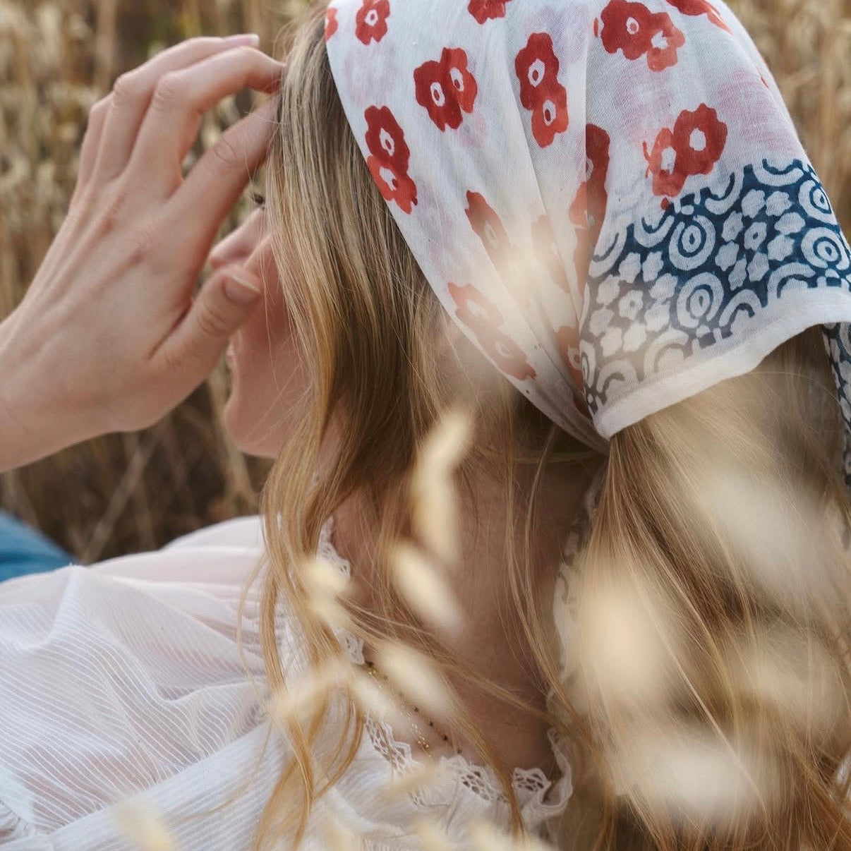 Bandana tied around a woman's head as a hair wrap