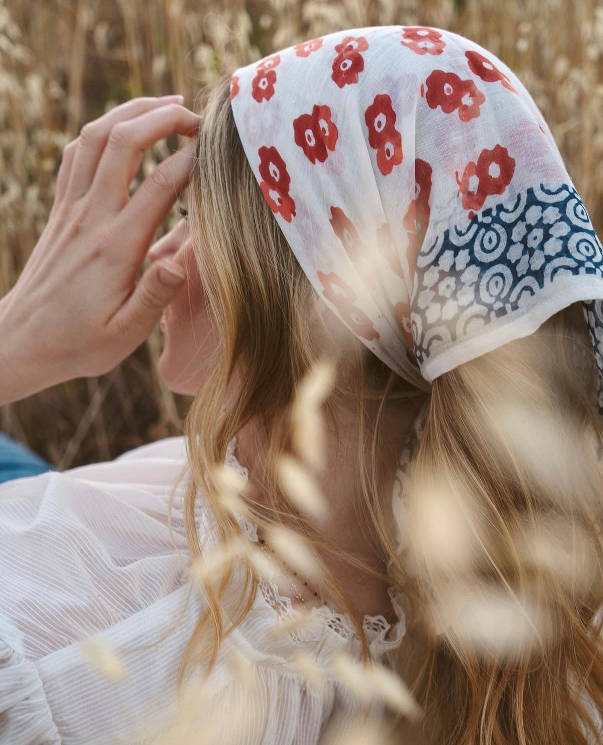 Bandana tied around a woman's head as a hair wrap