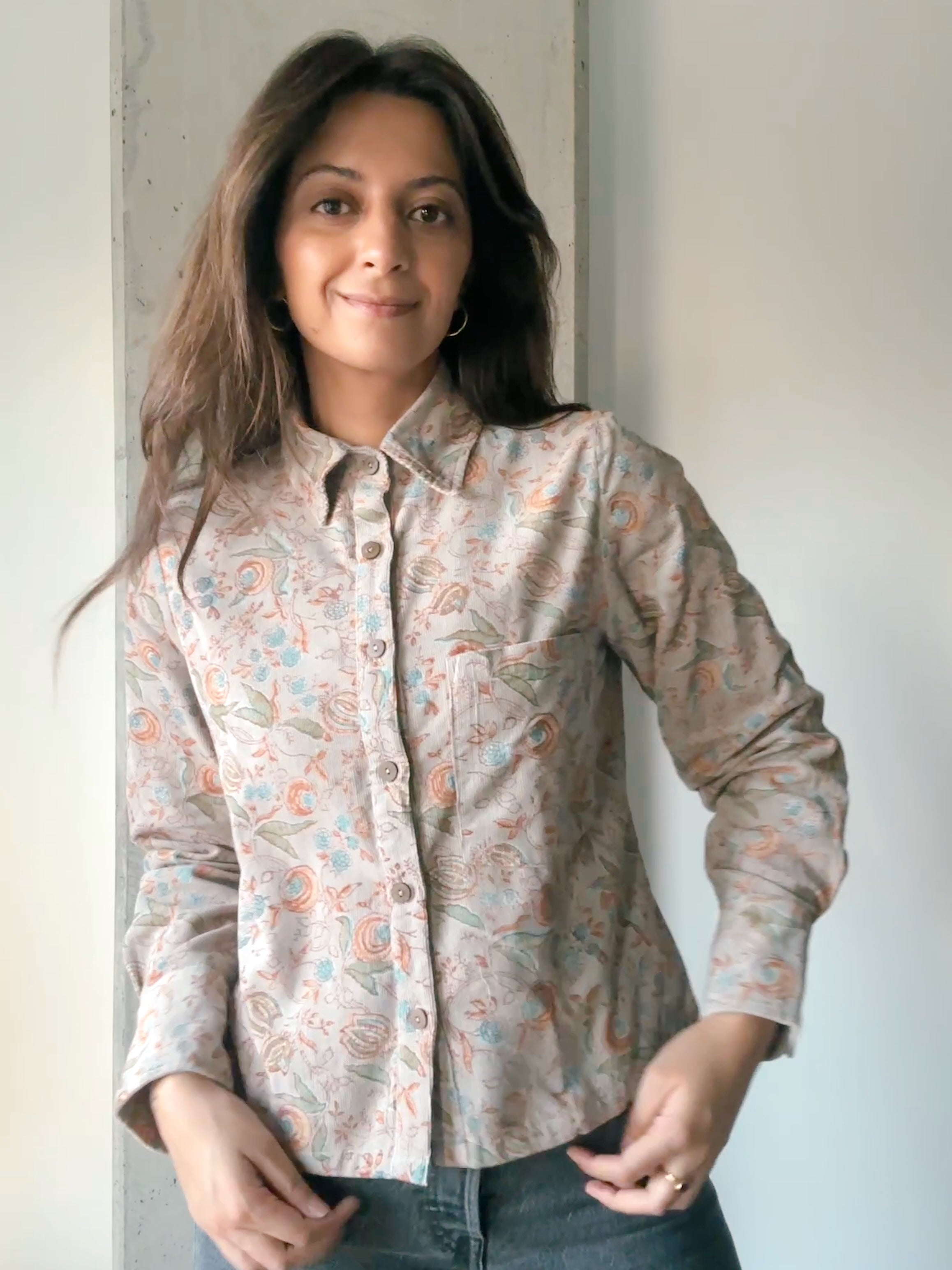 Woman wearing block printed corduroy floral printed Helena Shirt, front shot