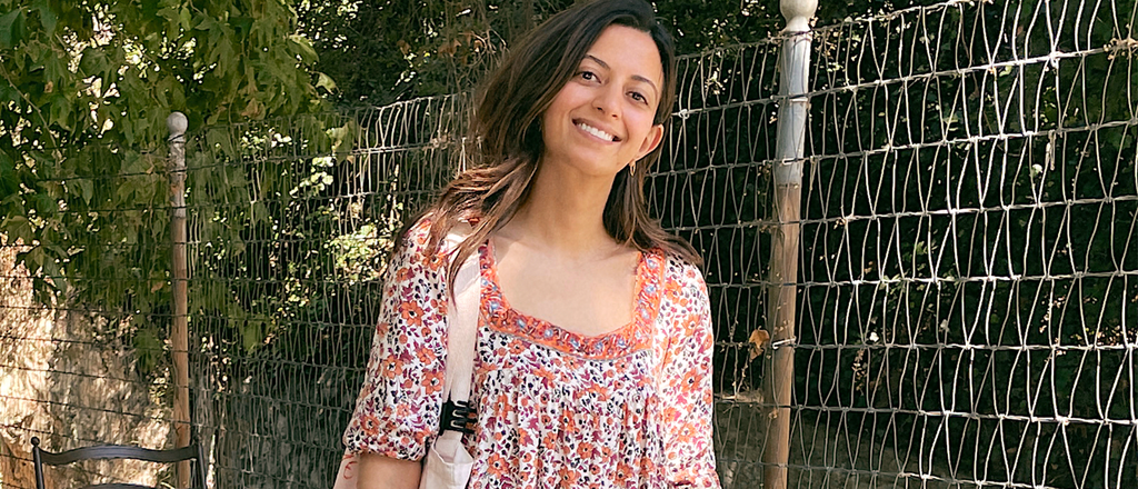 Nargis, co-founder of From, Mila wearing the Mia Midi Dress outside in LA