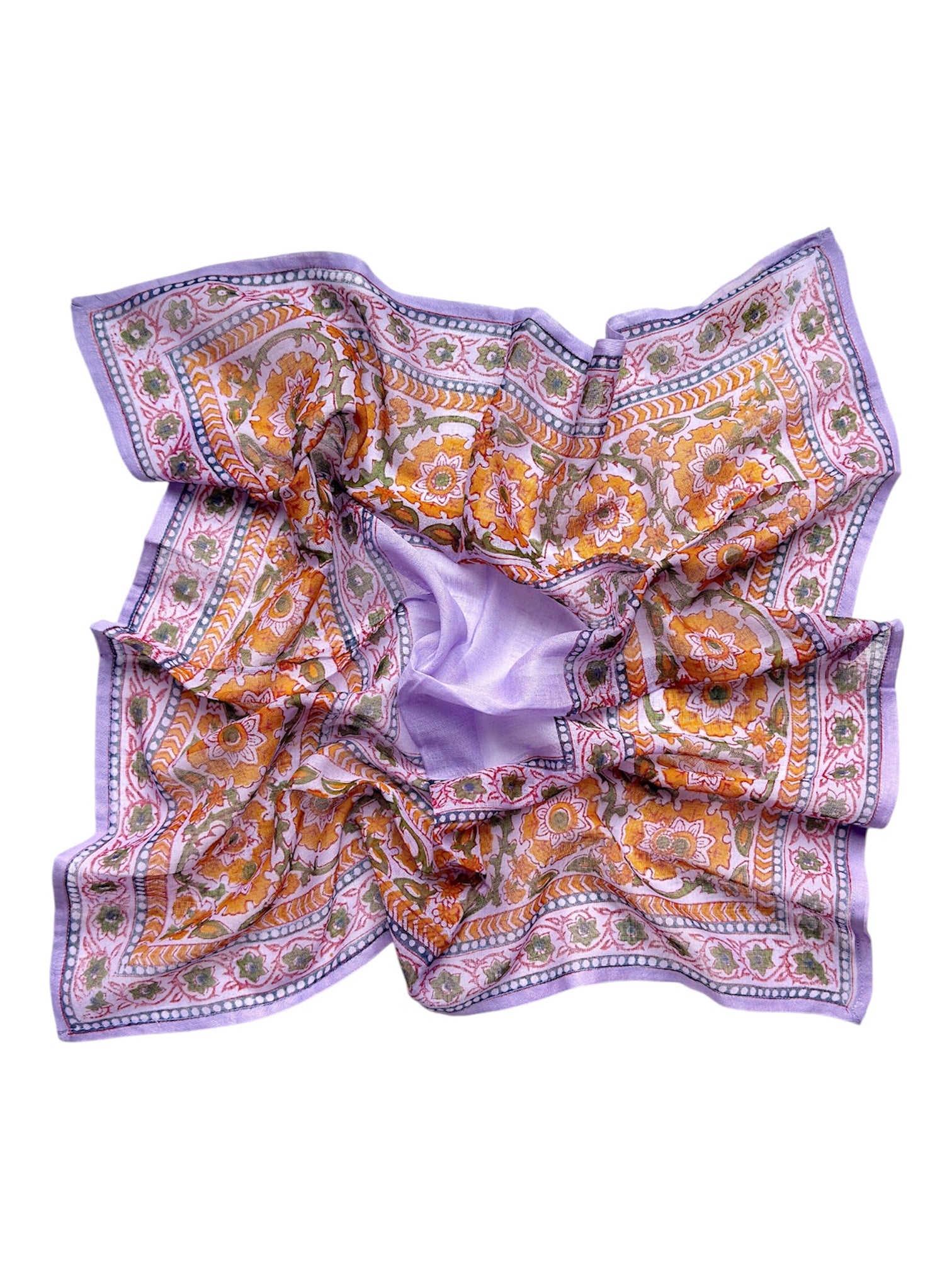 Chamomile bandana scarf laid flat on white background. Scarf has a lavender background with a green floral border print, and yellow flowers towards the center.