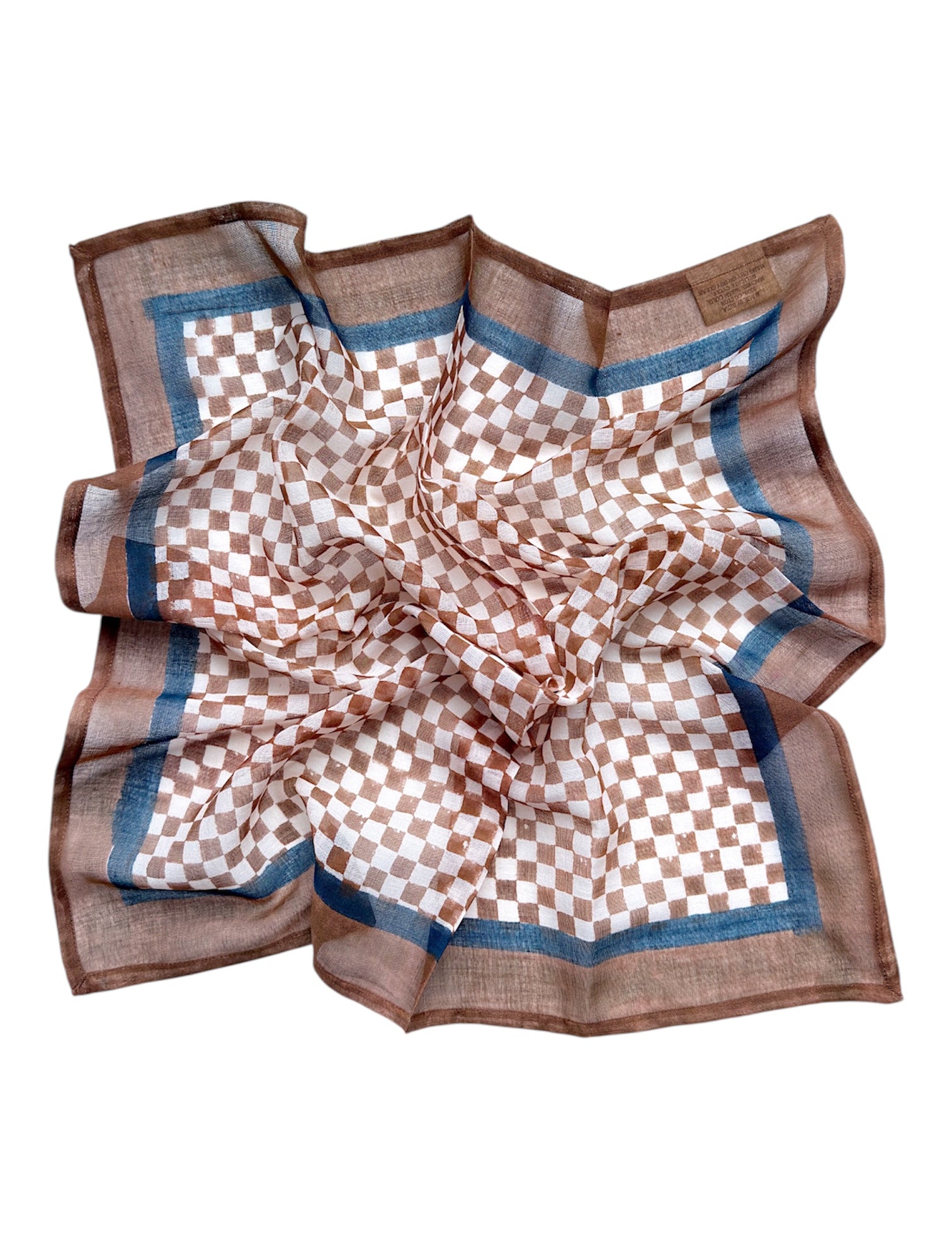 Checkered bandana scarf with brown and white pattern laid flat on a white background
