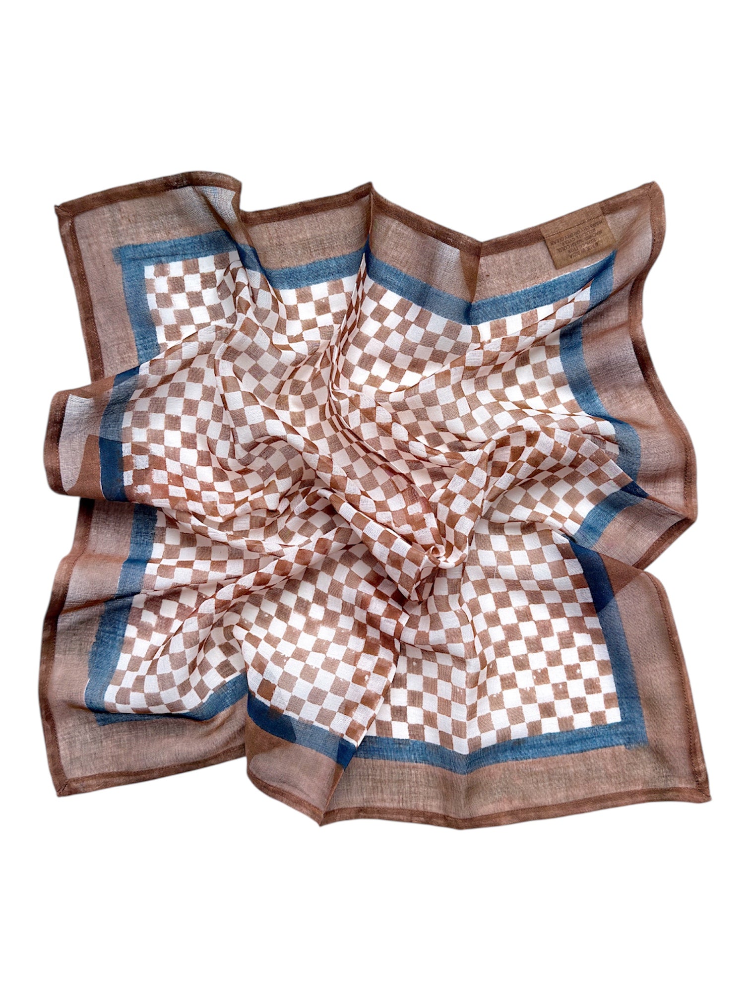 Checkered bandana scarf with brown and white pattern laid flat on a white background