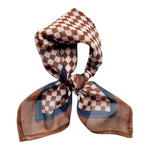 Checkered bandana scarf with brown and white pattern on a white background