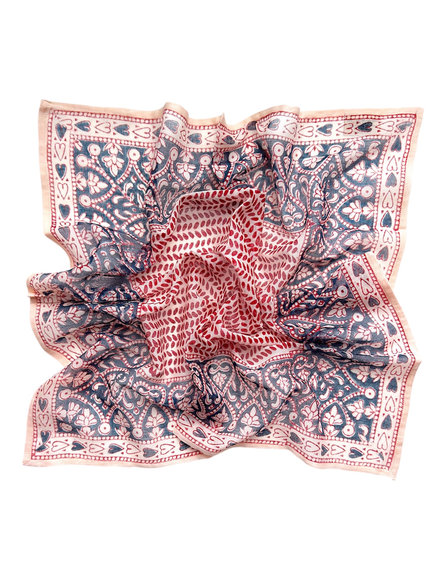 Decorative block printed bandana scarf with blue and red floral print, laid flat on a white background