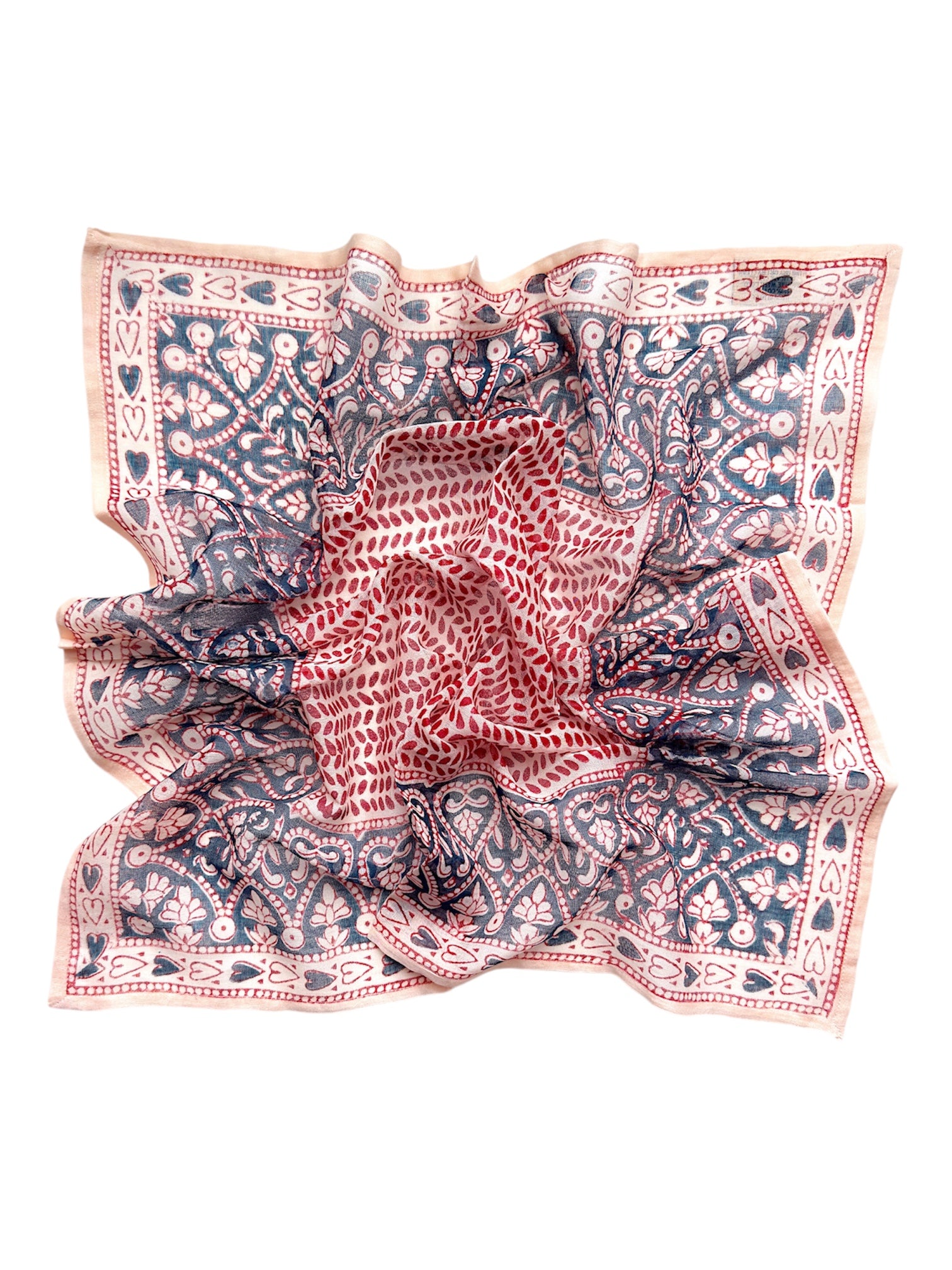 Decorative block printed bandana scarf with blue and red floral print, laid flat on a white background