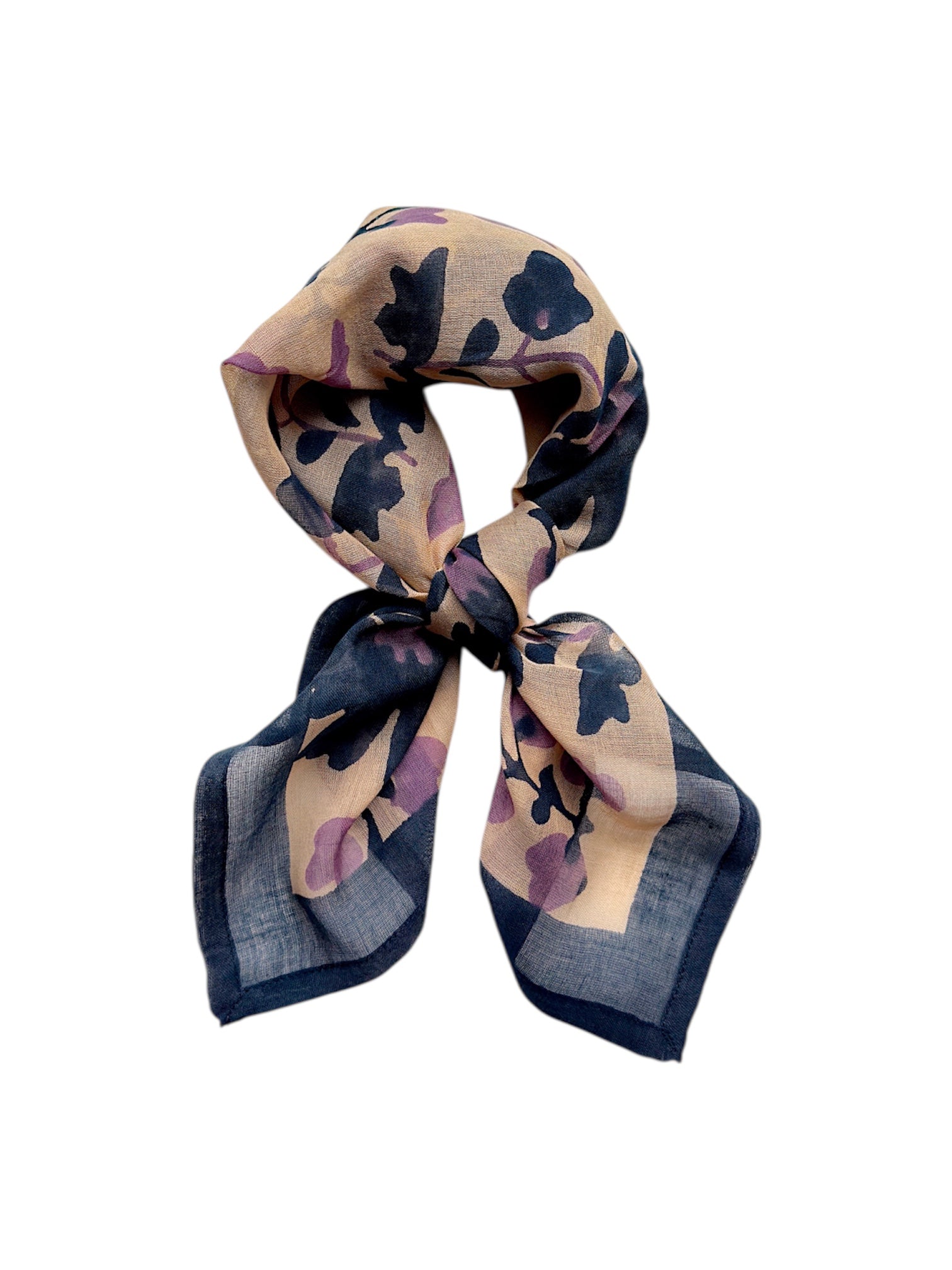 Blue and lavender floral printed bandana scarf, tied on a white background