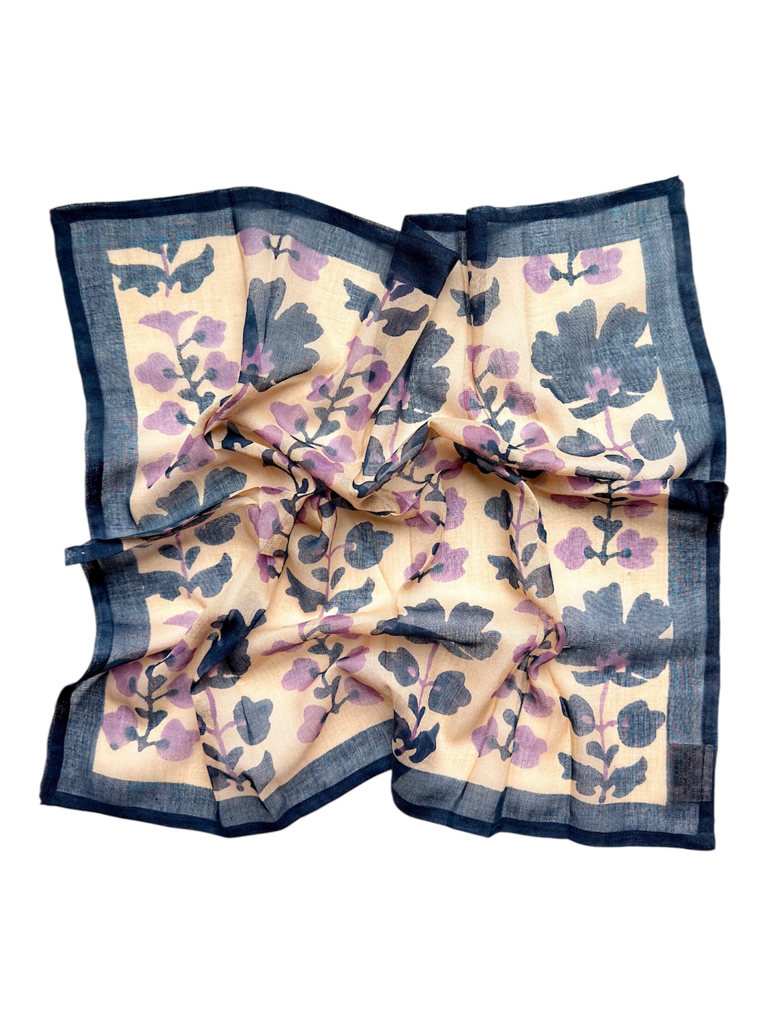 Blue and lavender floral printed bandana scarf, laid flat on a white background