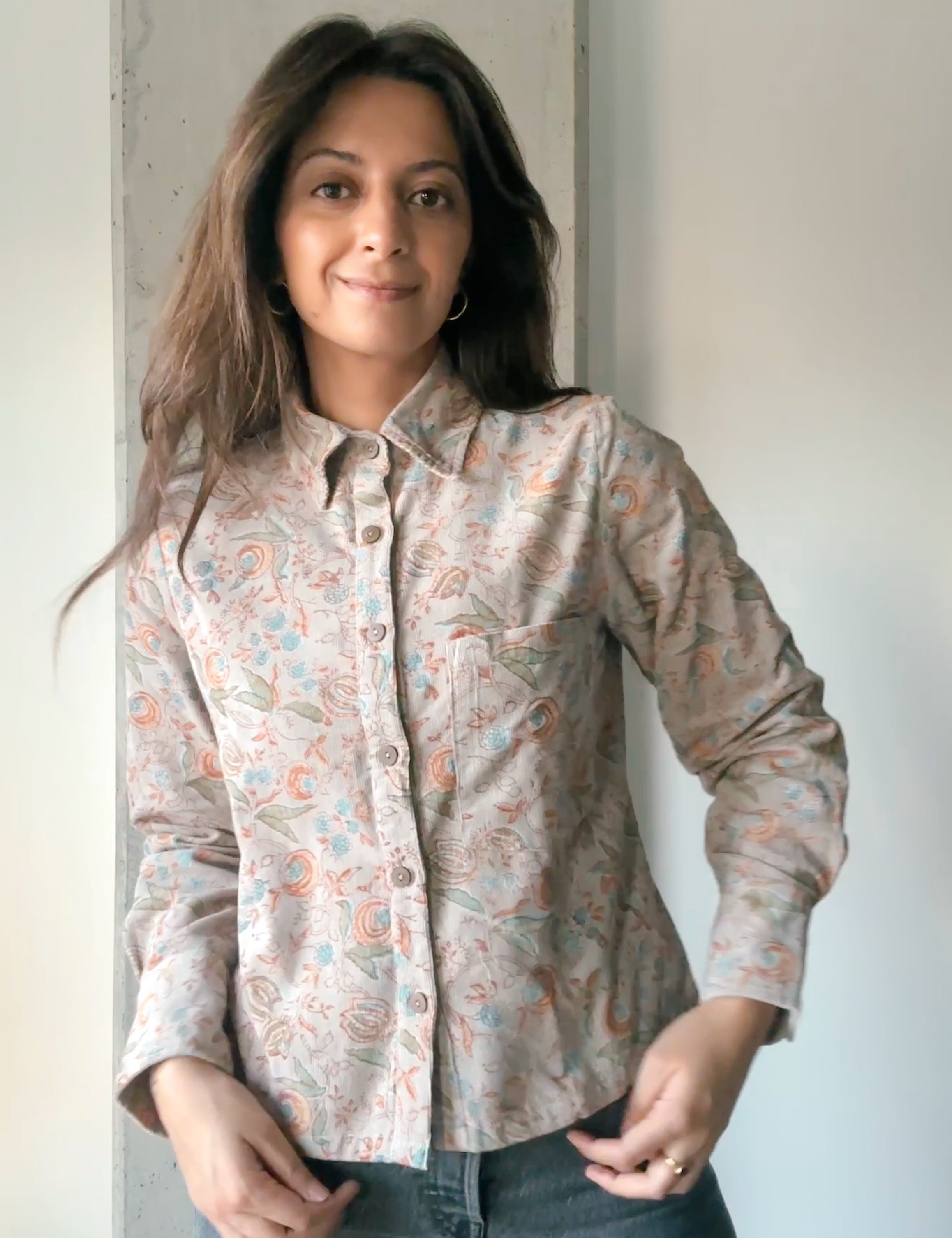 Woman wearing block printed corduroy floral printed Helena Shirt, front shot