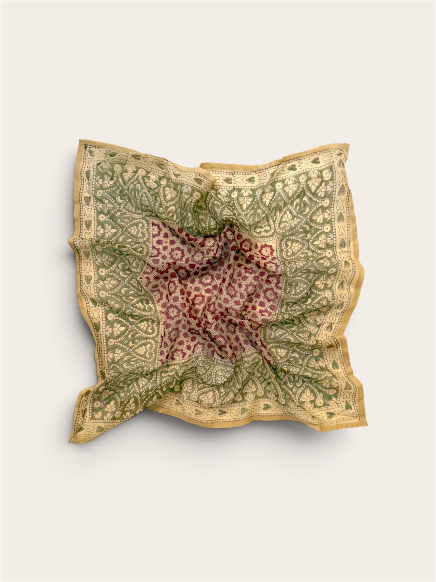 Sage & Mulberry Heart Motif Bandana Scarf in lightweight cotton flat lay display featuring deep mulberry center grid with sage green floral and heart border against off-white background