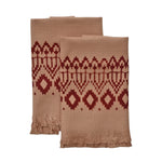 Block printed Terracotta hand towels, folded and laid flat. Towels have a geometric, diamond print. 