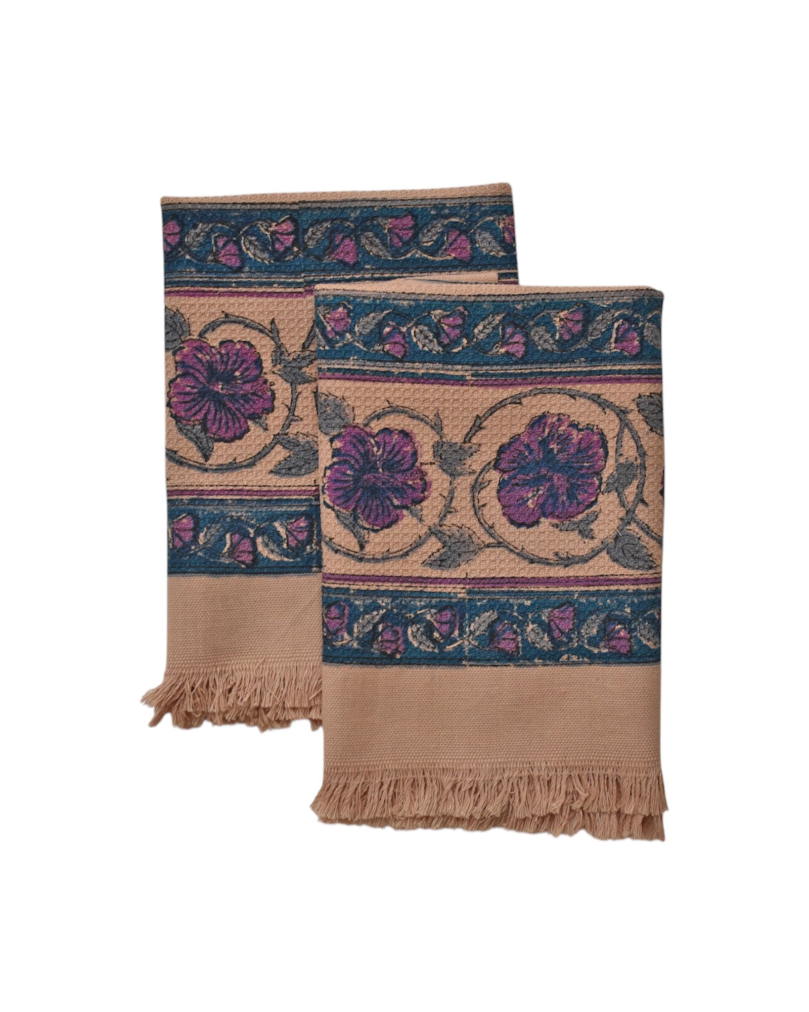 Block printed Lilac Khadi hand towels folded and laid flat. Towels have a large floral border print. 