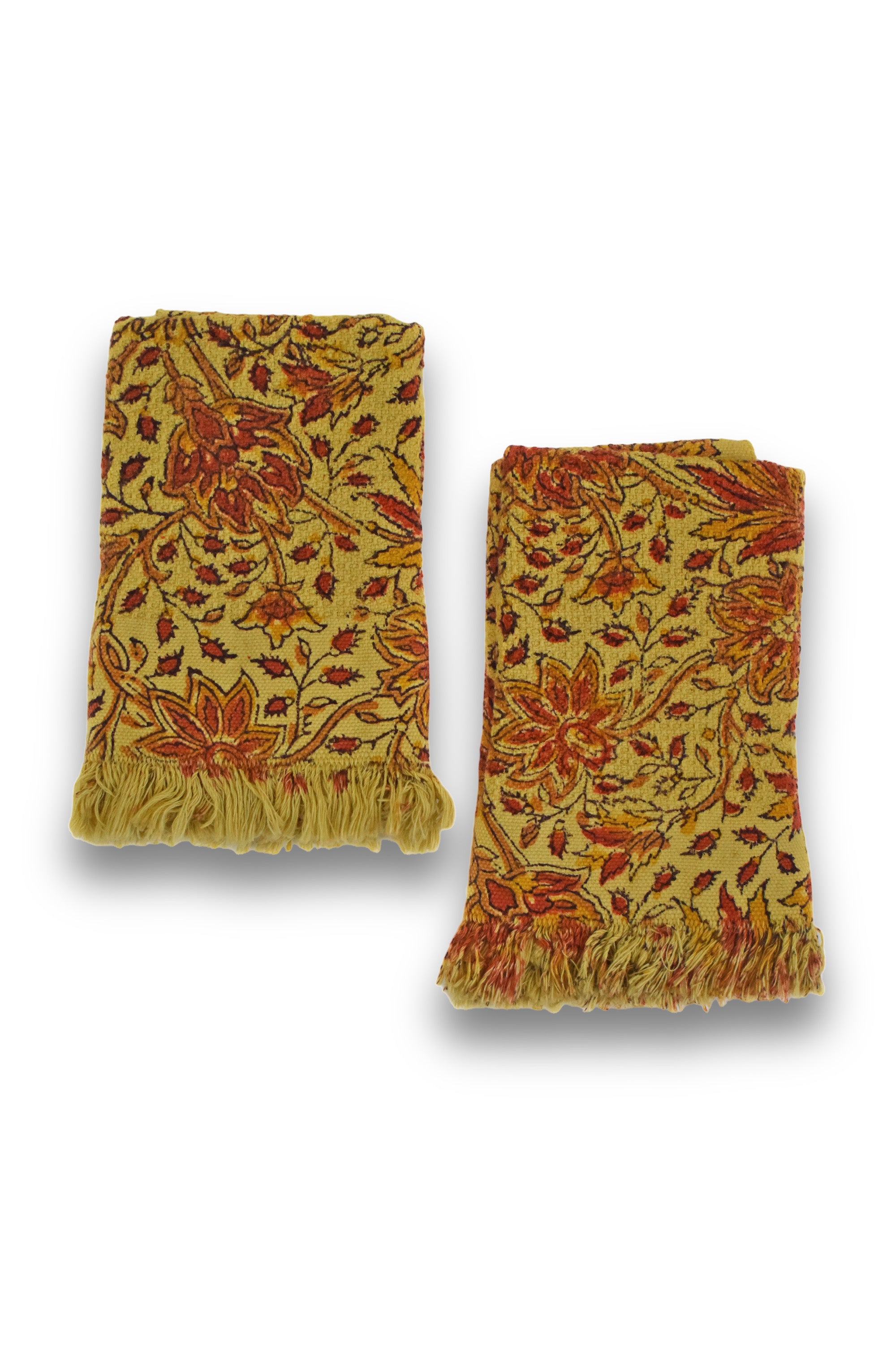 Two Penelope block printed hand towels folded and placed next to each other on a white background