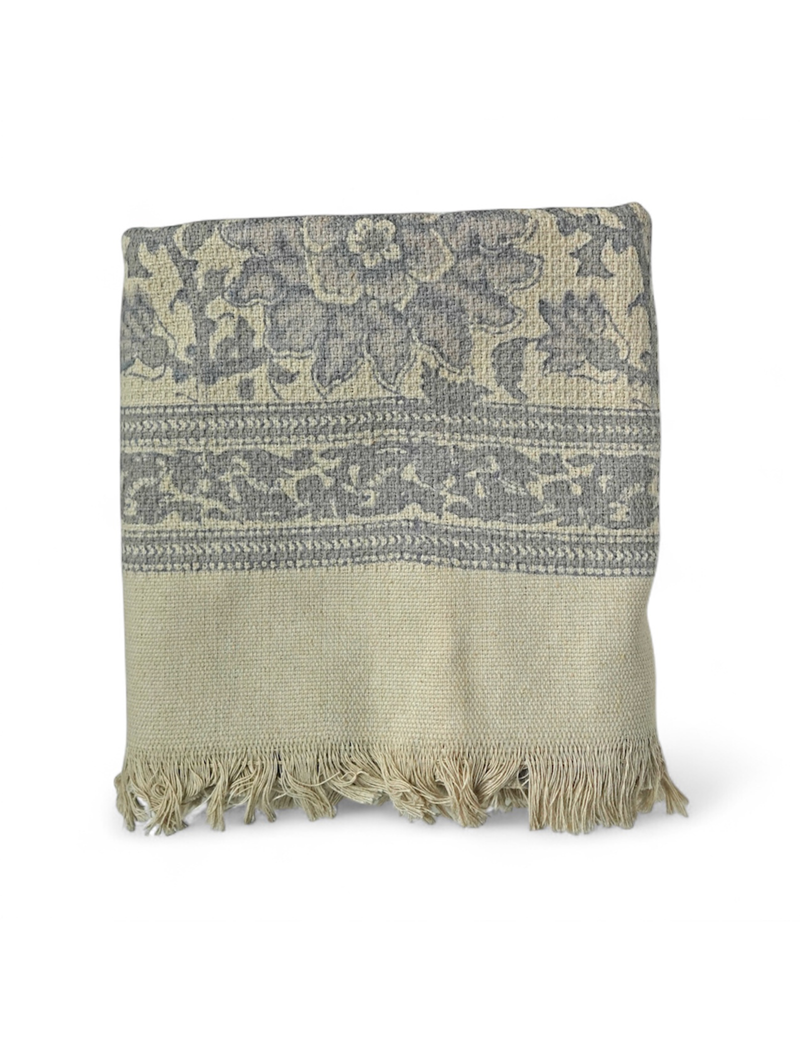 Grey bath towel with floral pattern and fringe on a white background