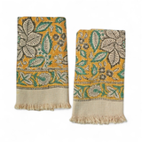Two decorative towels with yellow floral patterns on a white background