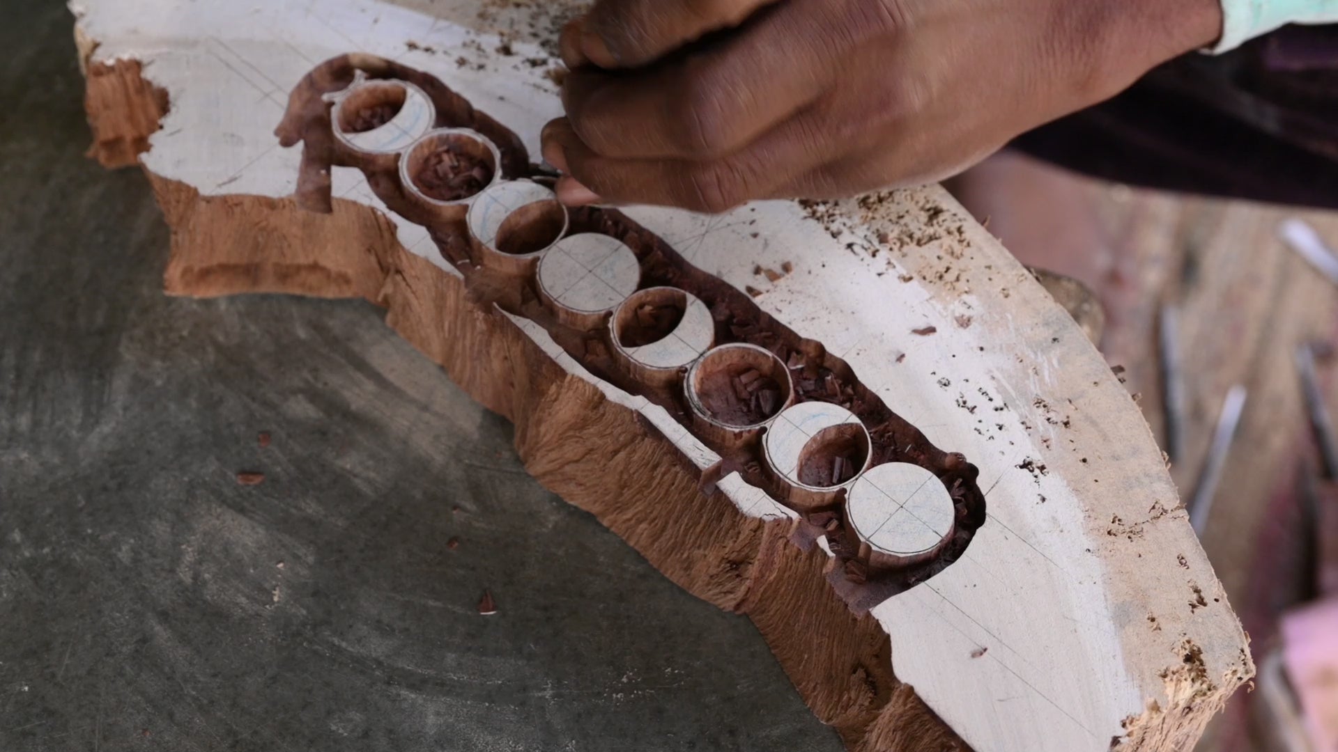 Video of hand carving the Astral print into a block of wood