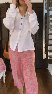 Nargis, co-founder of From, Mila, showing to how to style the Birkin cropped pant with a white shirt, loafers. Casual easy style for going out. 
