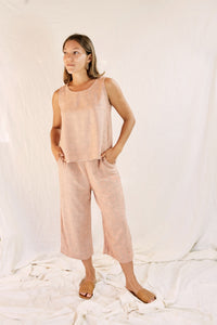 Model wearing the Alba set, against a cream color background