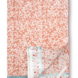 Blossom Kitchen Towel, folded with corner open to show one of the loops