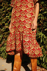 Close up of Sienna Ruffle Dress in the Sintra Print ruffle high-low hem
