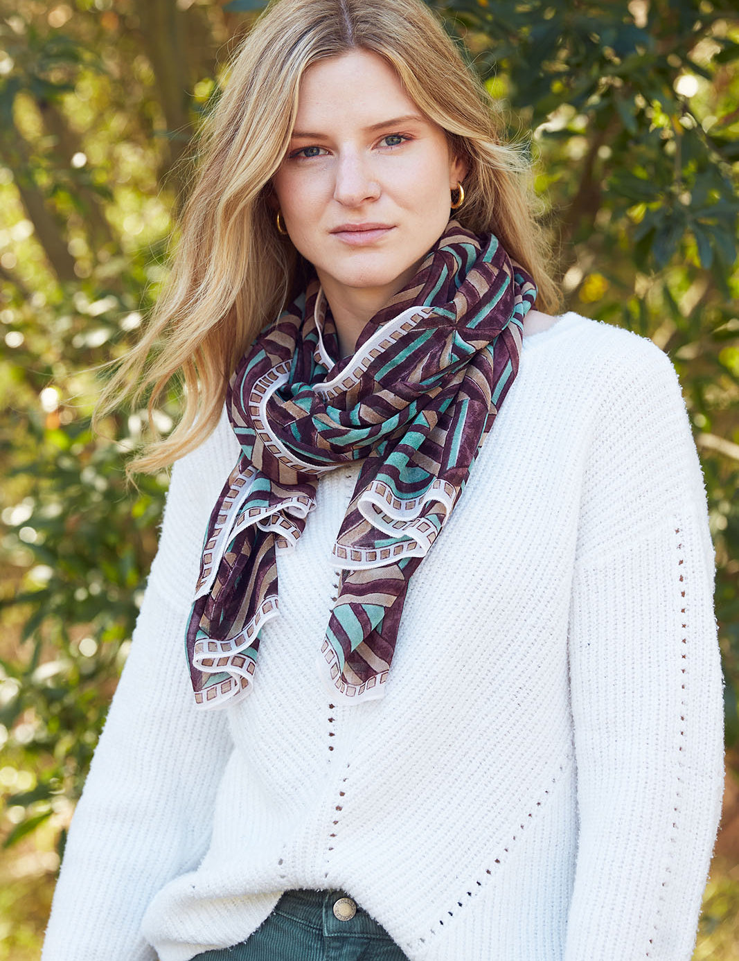 layla georgette scarf tied around the neck